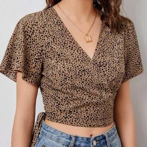 Cross cross tie blouse